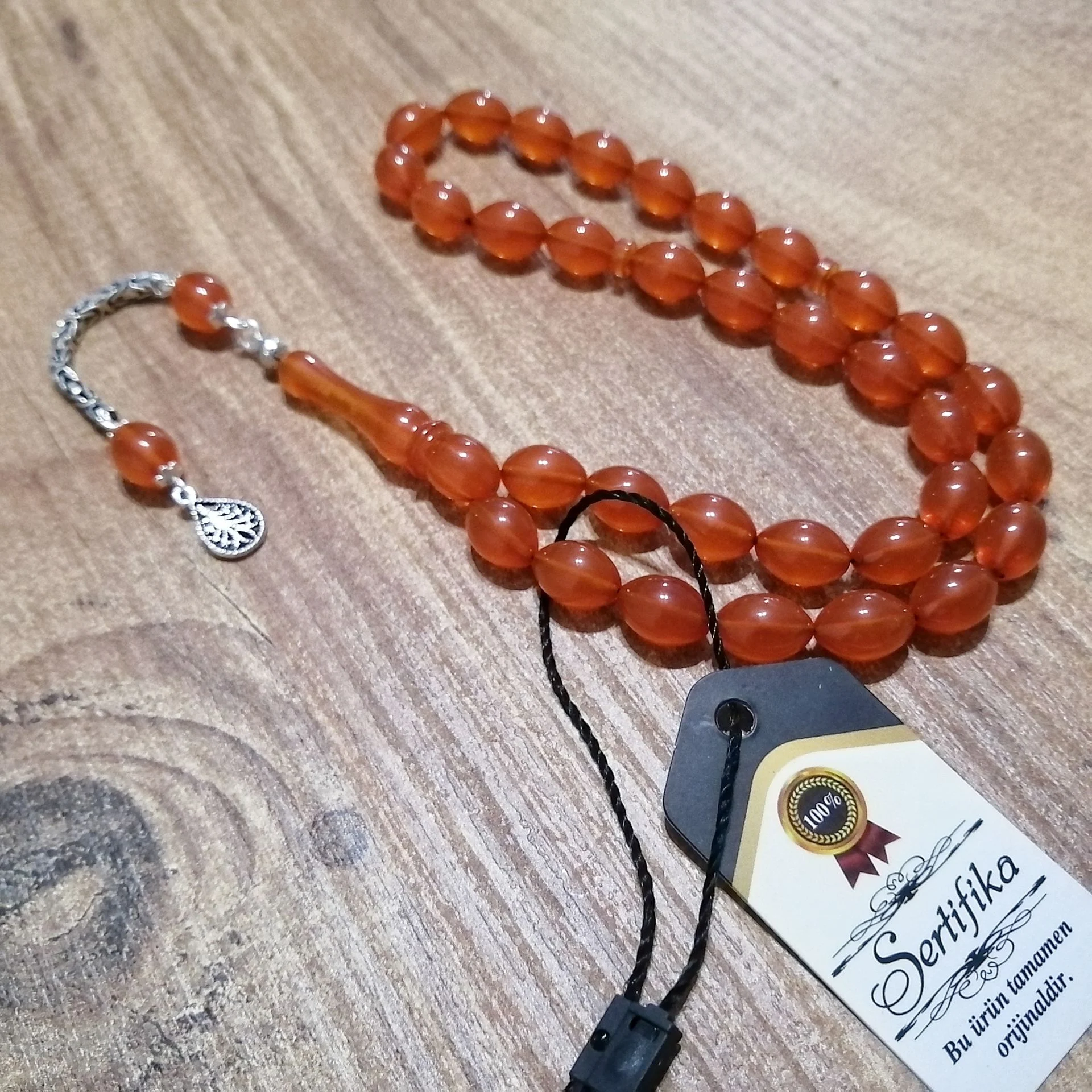 Gümüş Püsküllü Beyzi Kesim Sıkma Kehribar Tesbih